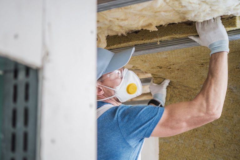 man cleaning home crawl space