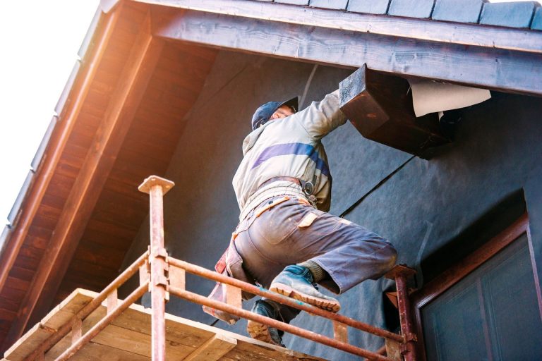 man working on home crawl space